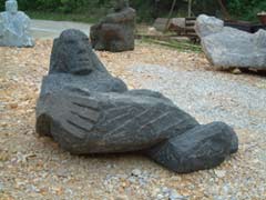 Reclined sculpture from the side
